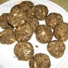 A batch of mushroom balls on a white patterned plate