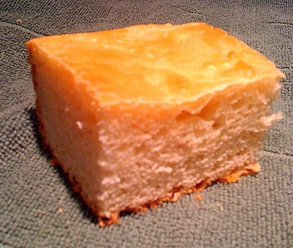 A square of ciabatta bread on a dark background