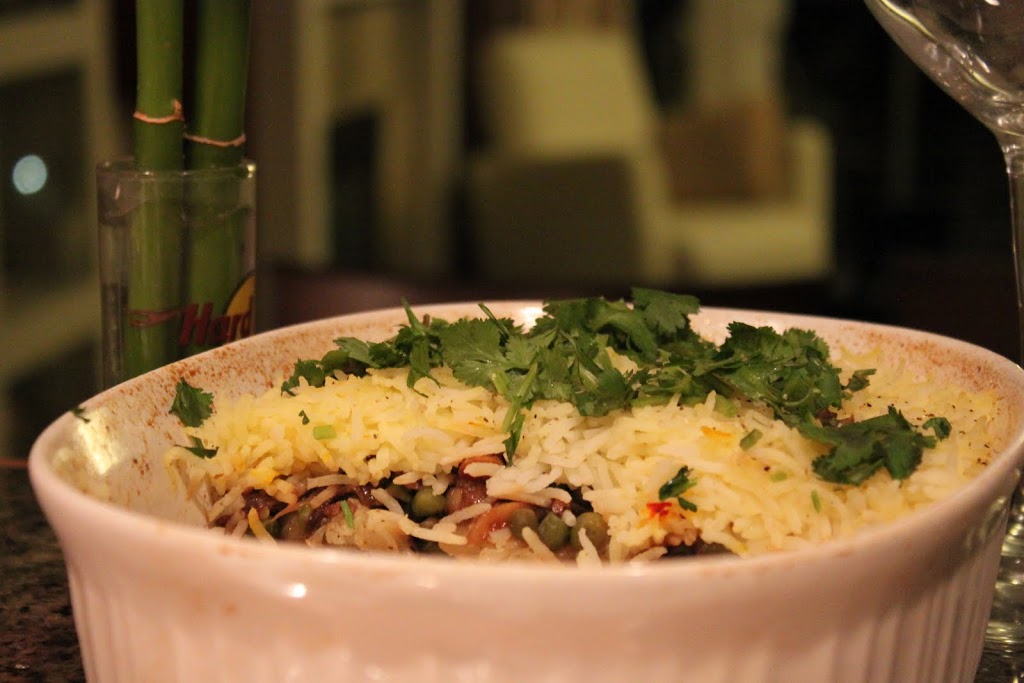 A 3 layer garlicky veg biryani. Packed full of delicious vegetables and spices and topped with fresh cilantro. Serve with hot Raita. Vegan and Gluten Free Recipe. #glutenfree #veganricha #vegan