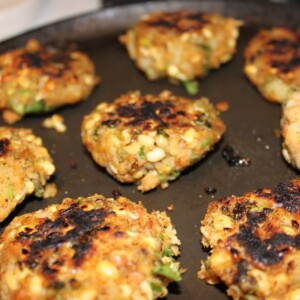 Sprouts potato cutlets on a black plate
