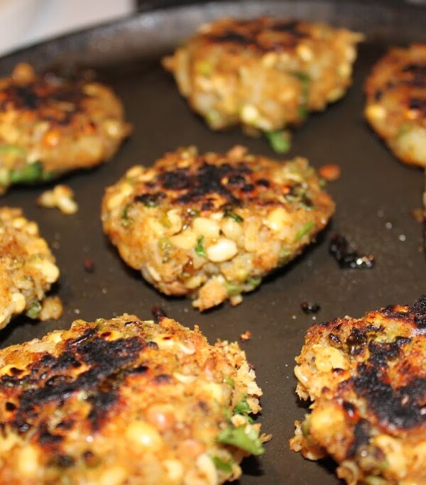 Sprouts potato cutlets on a black plate