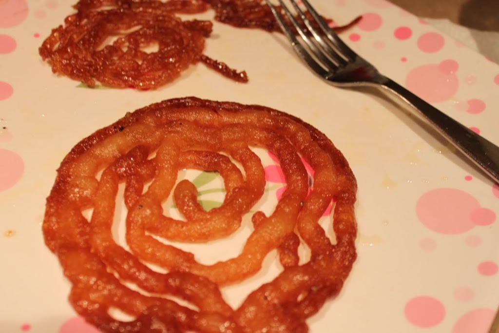 Vegan jalebi Recipe - Indian Sweet shaped like pretzels, deep fried and dipped in sugar syrup. Like a funnel cake.