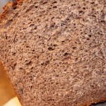 A loaf of indian gooseberry preserve wheat bread cut in half
