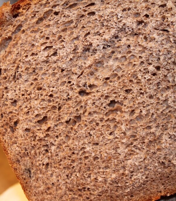 A loaf of indian gooseberry preserve wheat bread cut in half
