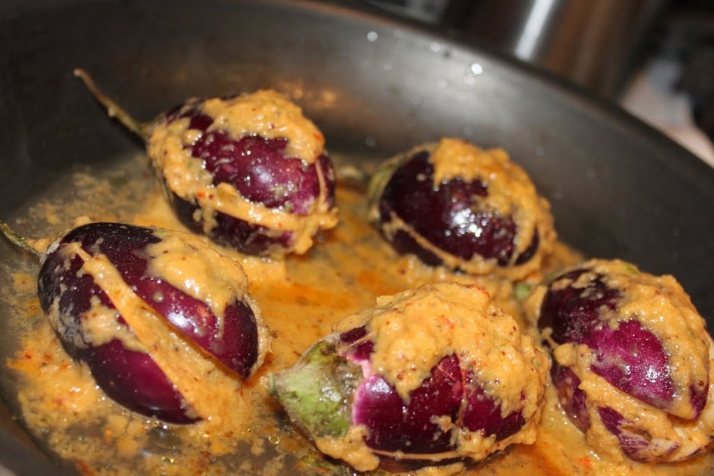 Achari Baingan(pickled eggplant curry) made with Marwari Stuffed Red Chili Pickle. Made with baby eggplants this dish is healthy, easy and full of flavor. Vegan and Gluten Free Recipe.#glutenfree #veganricha #vegan