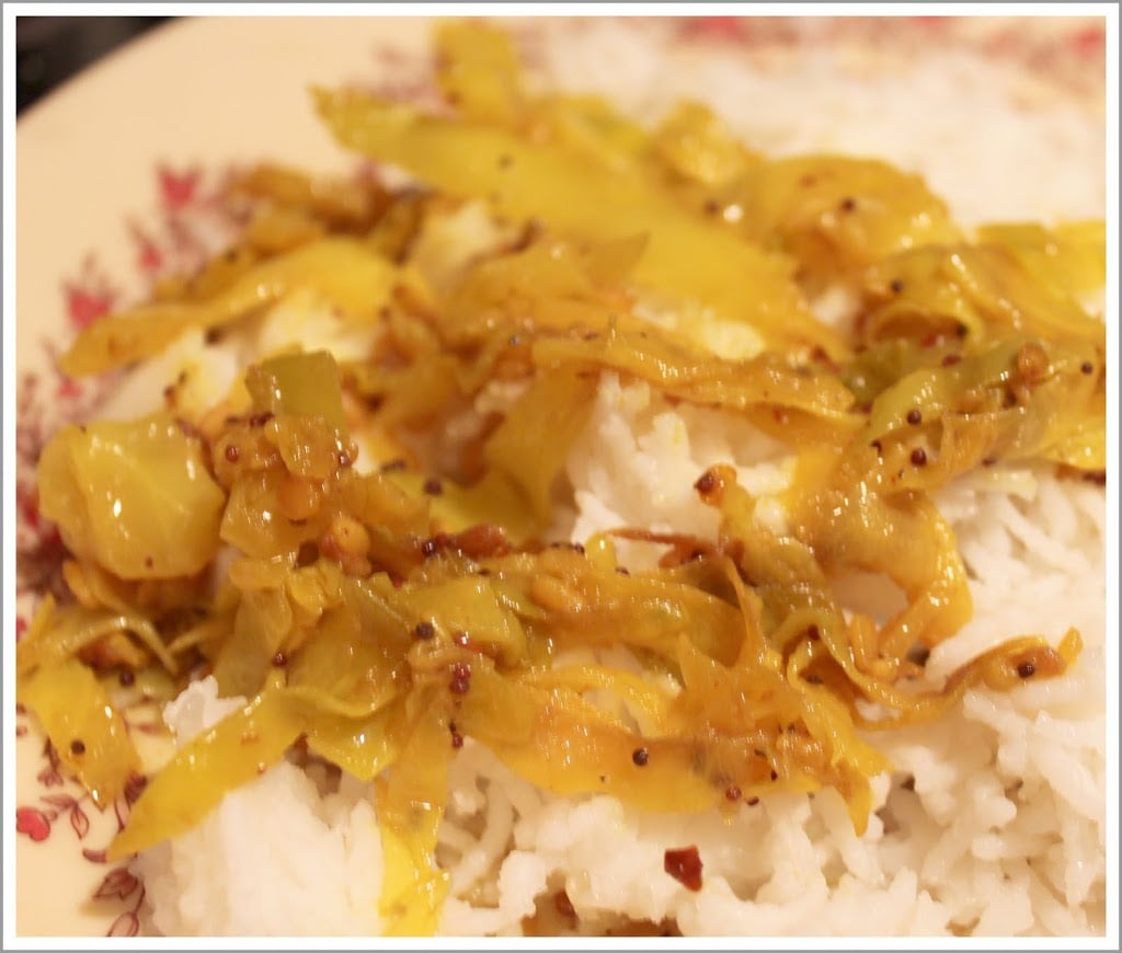 This quick spiced cabbage stir fry is an easy, delicious and healthy main dish. Vegan and Gluten Free Recipe. #glutenfree #veganricha #vegan
