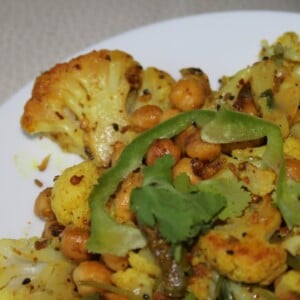 A close up of Achari Gobi on a white plate