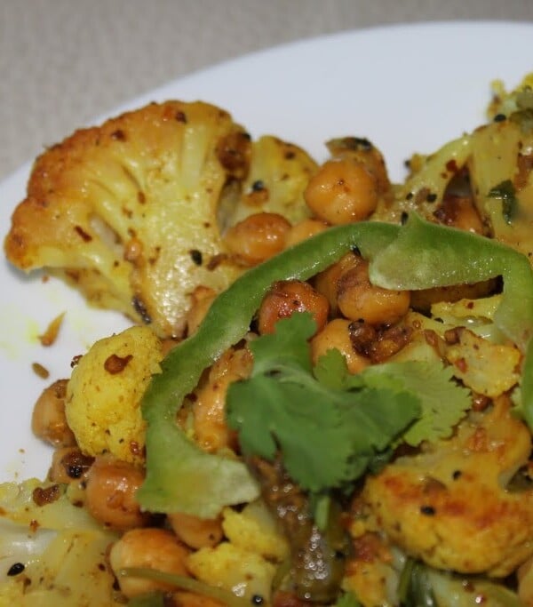 A close up of Achari Gobi on a white plate