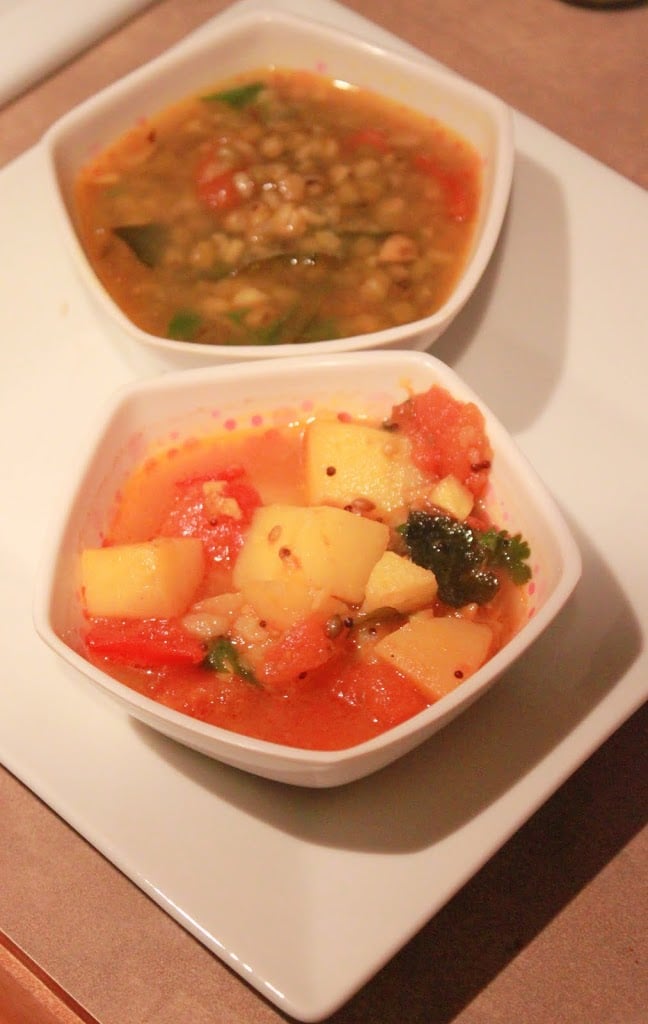 Potato in tomato curry. A quick and easy dinner recipe for weeknights, serve with rice and rot/chapati. Vegan and Gluten Free Recipe. #glutenfree #veganricha #vegan