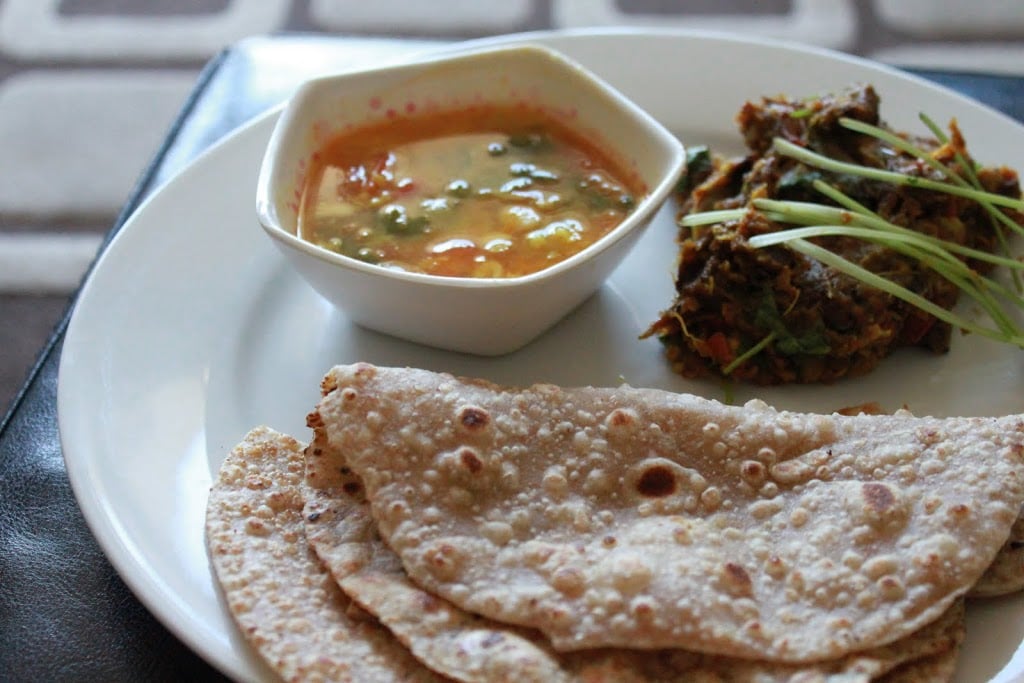 Baingan Bharta, Sambhar, Roti and Papad (roasted mashed eggplant, pigeon pea curry, Indian Flat Bread and lentil chips). Vegan Recipe. #veganricha #vegan