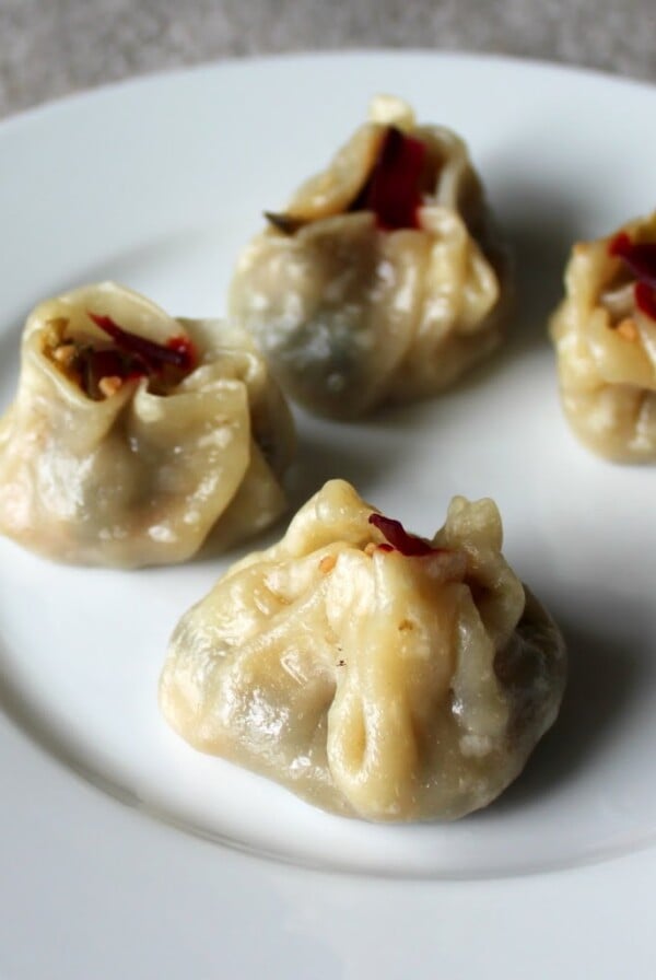 Shu Mai dumplings served on a white plate