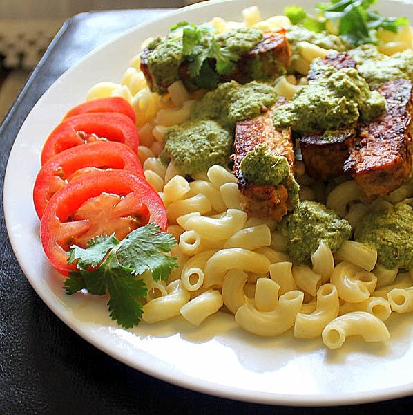 Pasta with Spicy Blackened Tempeh and Cilantro Almond Pesto. A delicious and simple pasta dish made with a creamy almond pesto. Vegan and Gluten Free. #glutenfree #veganricha #vegan