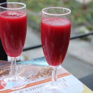 Two glasses of mango beet spiced cooler