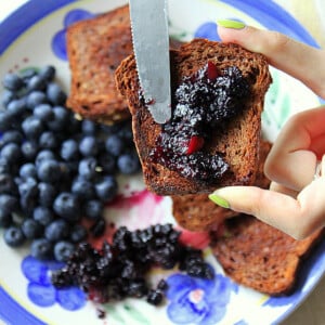 Jam being spread on french toasts