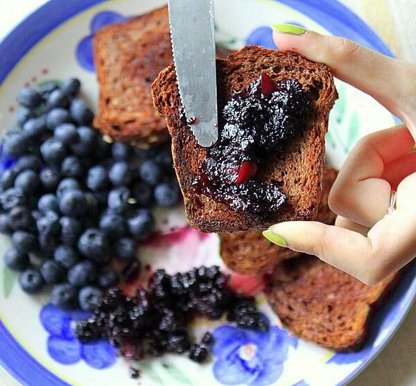 Jam being spread on french toasts