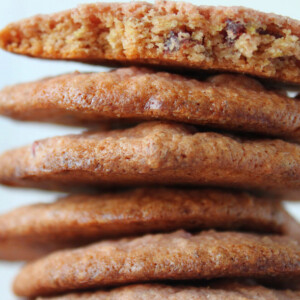 A stack of crystallized Beet Multigrain Thins on a white background