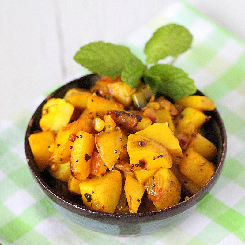 Potatoes with whole Indian spices. A delicious and easy side dish for any day of the week. Vegan and Gluten Free Recipe. #glutenfree #veganricha #vegan