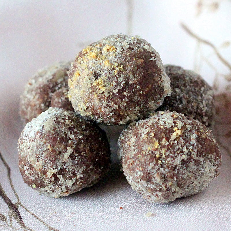 Gingerbread spiced Chocolate Nut butter truffles. Chocolate Nut butter spiced truffles rolled in Gingerbread spices. Easy Holiday treat. | VeganRicha.com #vegan #glutenfree #truffle