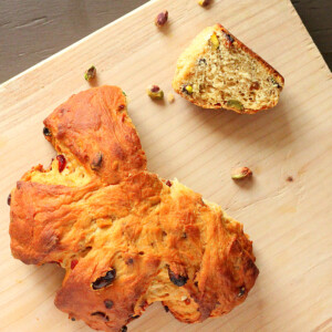 Christmas stollen wreath on a wooden chopping block