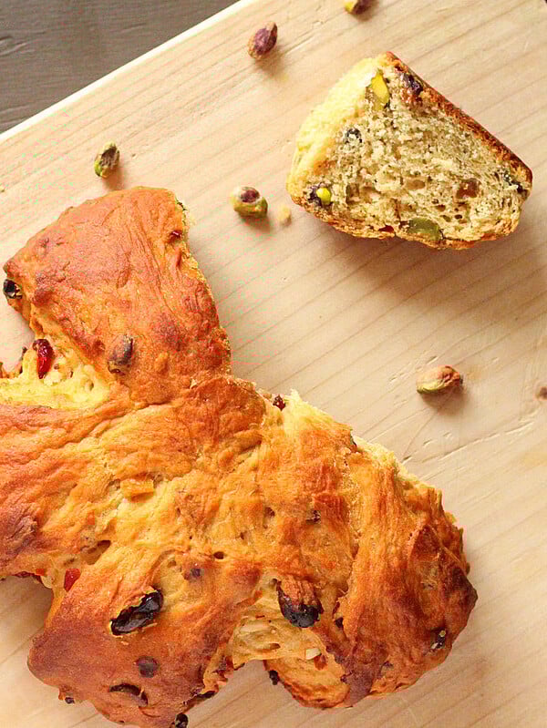 Christmas stollen wreath on a wooden chopping block