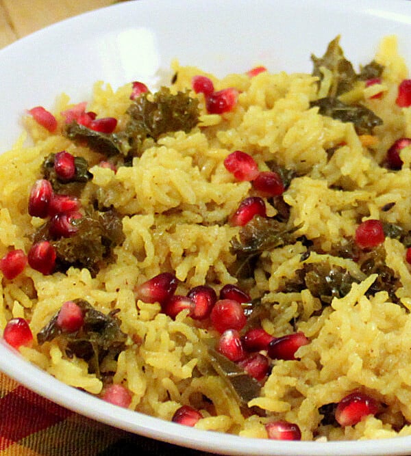 vegan rice kale pilaf served in a white bowl