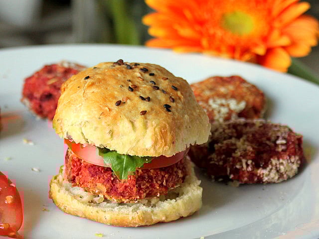 Beet, Oats, Garbanzo Bean/Chickpea Burger Sliders served topped with tomatoes, basil or baby greens between multigrain olive oil buns. Vegan Recipe. #veganricha #vegan