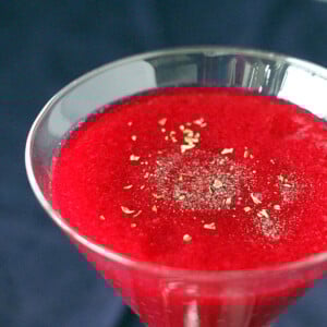 Red Beet, Pear, Minneola orange and Apple Smoothie served in a martini glass