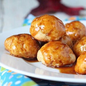 Sweet potato donut bites served high on a white plate