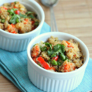 Quinoa pikaf served in two ramekins on a blue cloth
