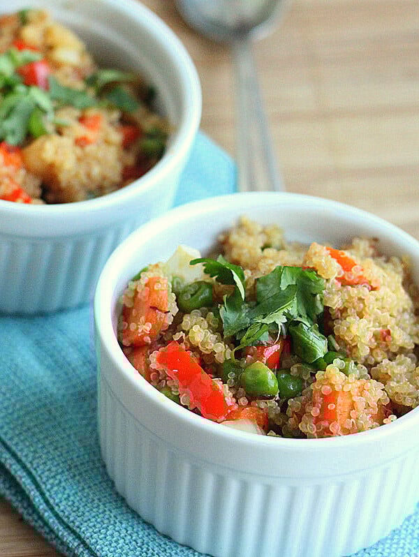 Quinoa pikaf served in two ramekins on a blue cloth
