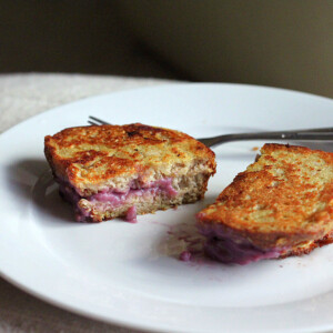 Stuffed French Toast cut in half on a white plate