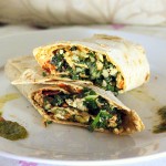 A cauliflower wrap cut in half and stacked