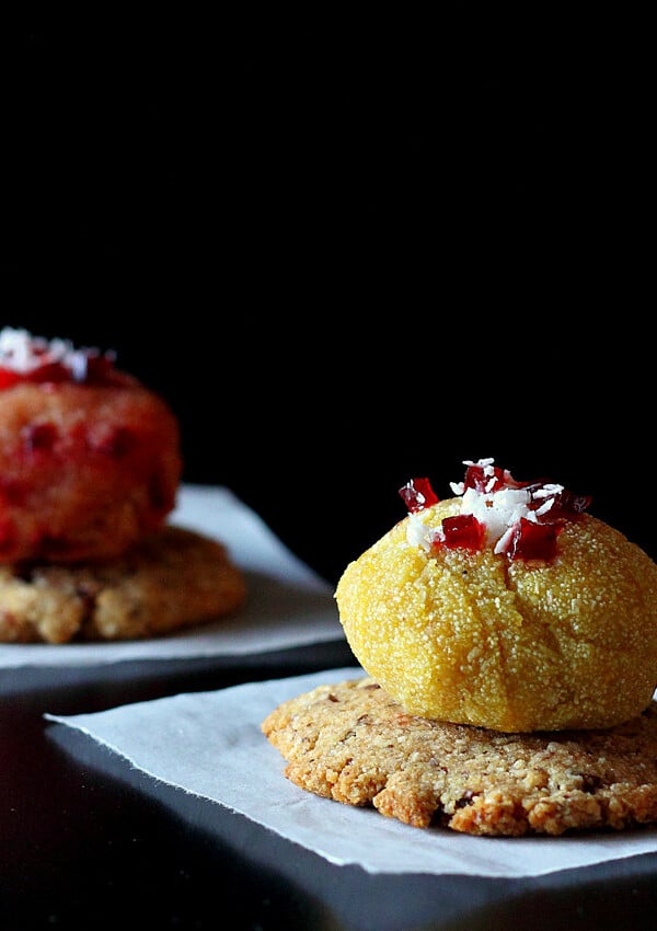 Halwa balls on crackers, served on white plates