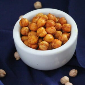 Roasted sprouted chickpeas in a small white serving bowl