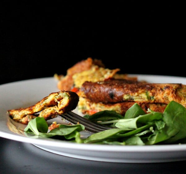 A chickpea flour omlette served with a side salad