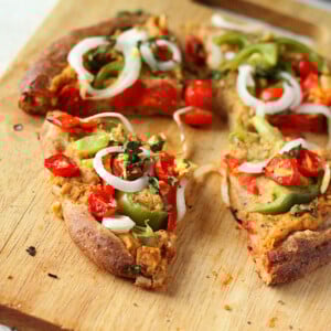 The pizza toppings have indian flavors with the Chana masala Spice hummus, some grated fresh ginger and cilantro garnish.. You can make it your own to taste! #glutenfree #veganricha #vegan