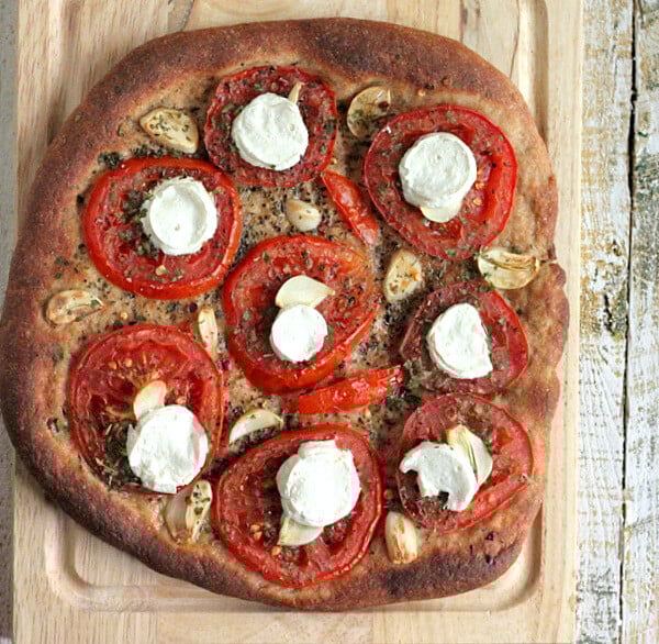 Tomato Garlic Coconut Mozzarella on 100% Whole Wheat crust Pizza. Add a layer of marinara and fresh basil! Vegan Pizza Recipe. Makes 1 Pizza