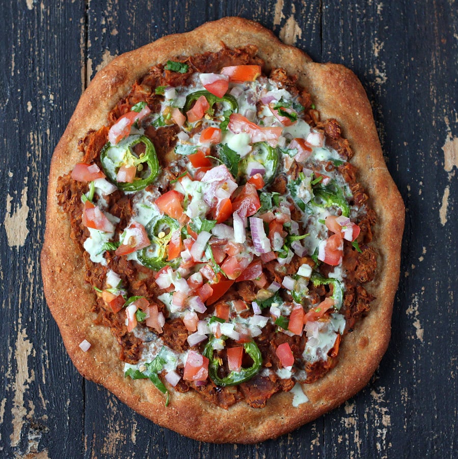 Vegan Mexican Pizza -Chipotle Refried Beans, Pico De Gallo, Lime crema | Vegan Richa