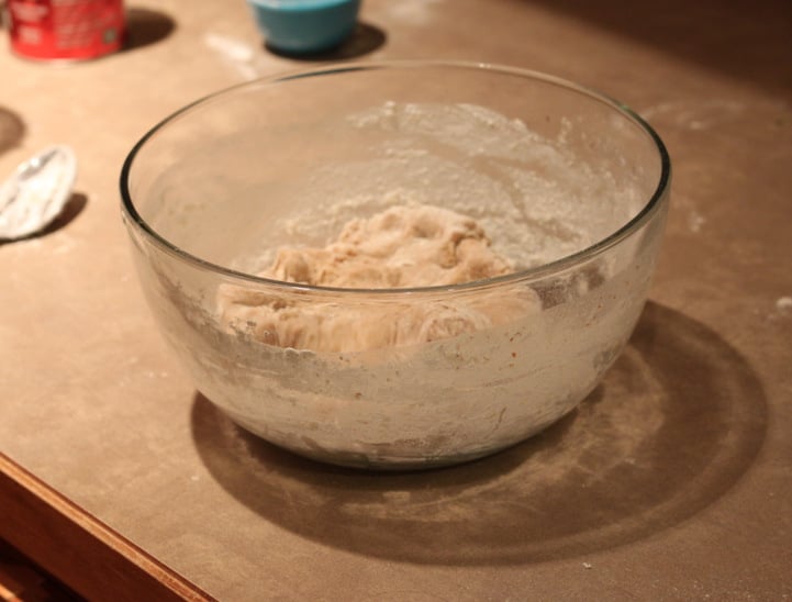 vegan cinnamon rolls  vegan cinnamon bun dough in a glass bowl