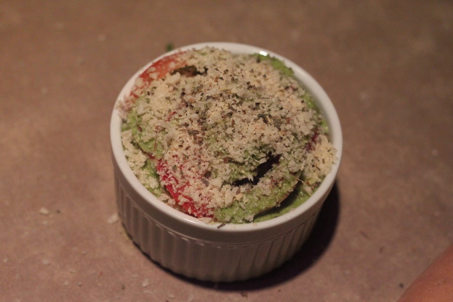alfredo bake vegan alfredo bake being topped with breadcrumbs