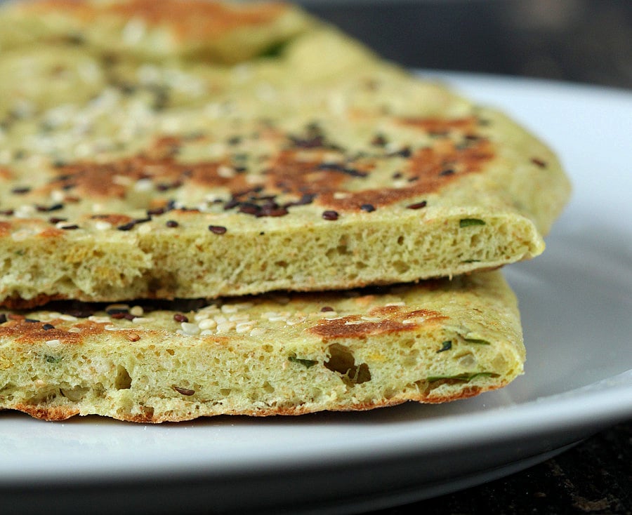 This Oil-free Avocado Naan does not need yogurt. Avocado adds the moisture and fat to keep this flat-bread moist for days. | VeganRicha.com #vegan #flatbread 