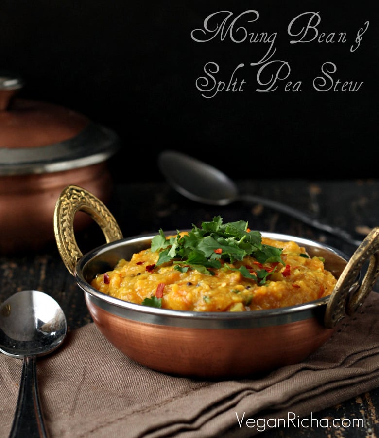 mung dal side view of a bowl of vegan Mung Dal and Pigeon Pea Stew garnished with fresh herbs