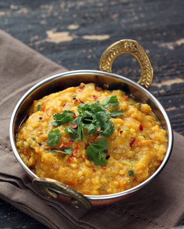 mung dal an Indian serving bowl filled with Mung Dal Split Pea Soup
