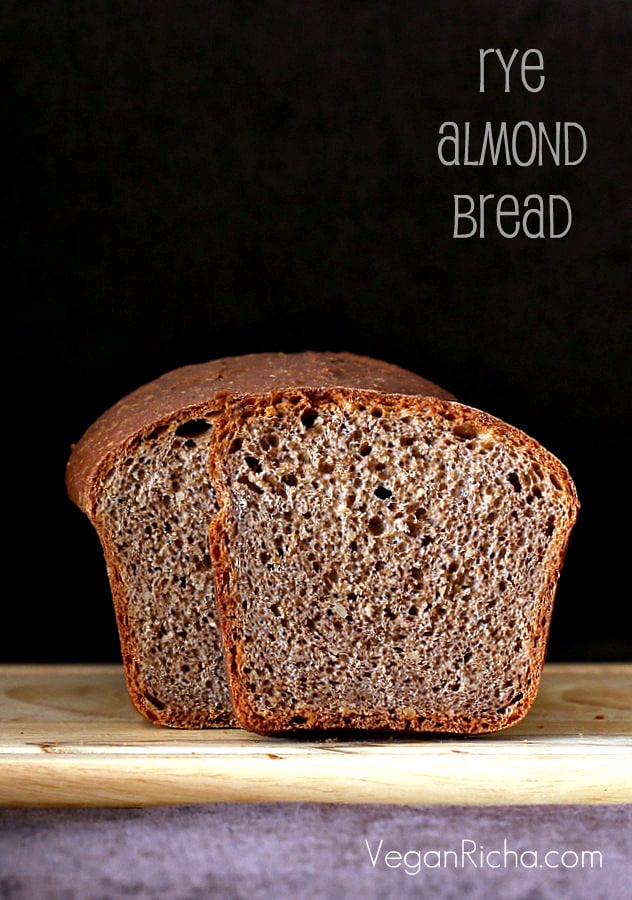 side view of vegan rye almond flour sandwich bread on a wooden board