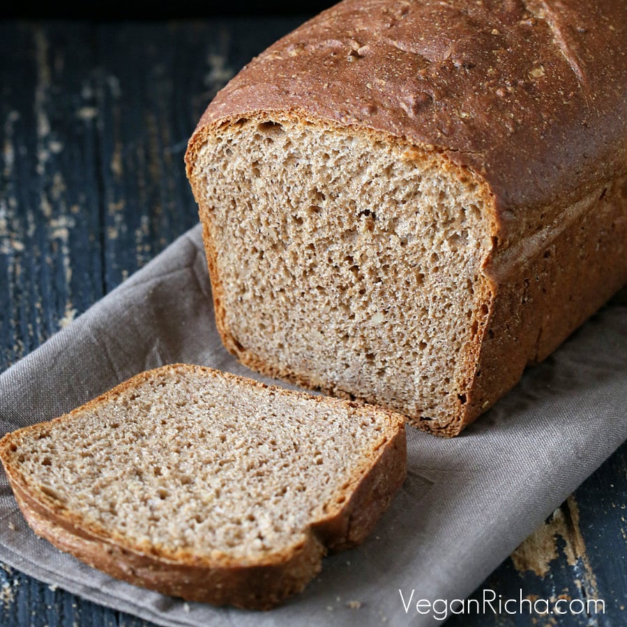 vegan burger buns  Vegan Rye Almond Sandwich Bread with one slice cut