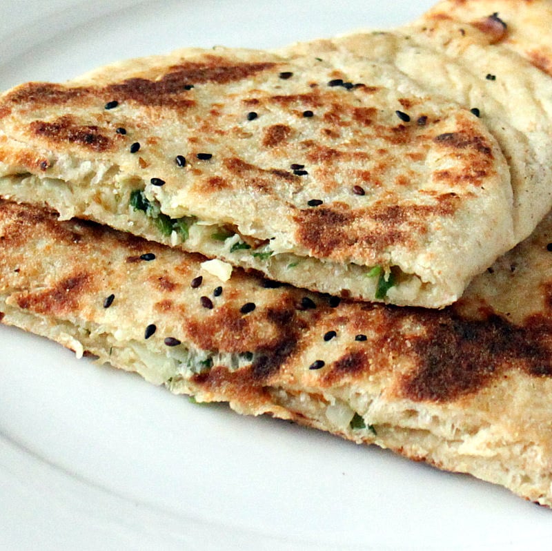 This Vegan Naan flatbread is easy and delicious. Vegan Naan Recipe. Bake it in an oven or cook on stove top. Garlic Naan. Avocado Naan. Cauliflower Stuffed Naan. Dairy-free VeganRicha.com