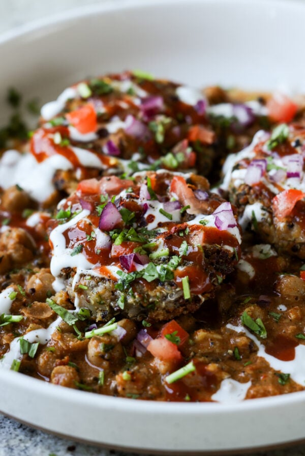 tikki chole in a bowl after adding toppings