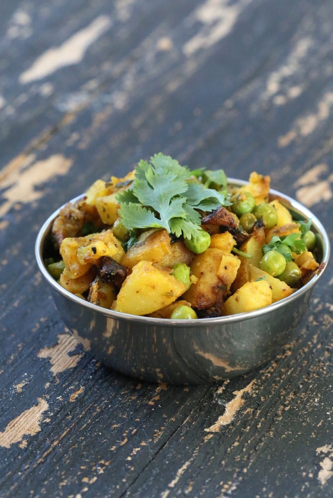 Dhania Waale Aloo Matar. Potatoes and peas spiced with Indian spices and cilantro | Vegan Richa