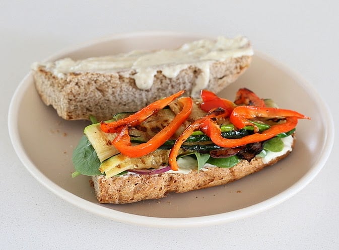 vegetable sandwich  healthy vegan roasted vegetable sandwich being assembled
