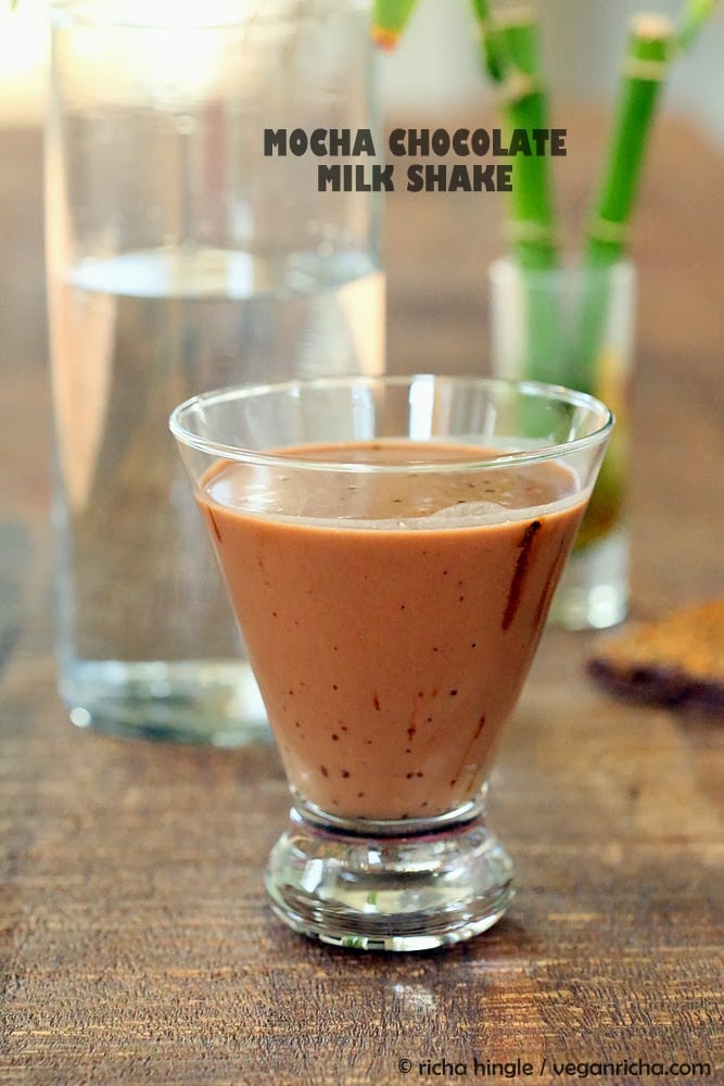 vegan milkshakes side view of a glass of thick and creamy Vegan Mocha Milkshake